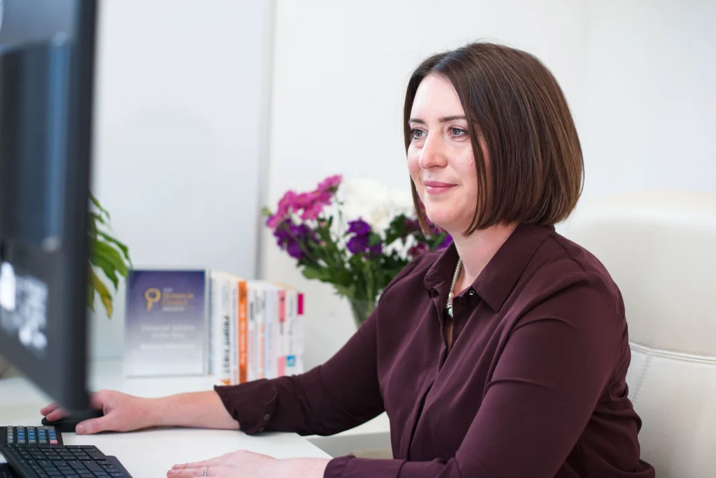 Rebecca Robertson, Ethical IFA working at her computer