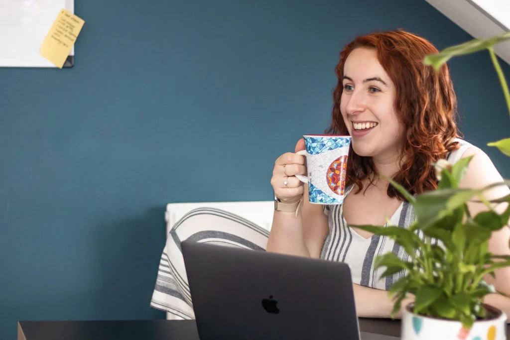 Rachel Mess drinking a cup of tea and building an accessible website